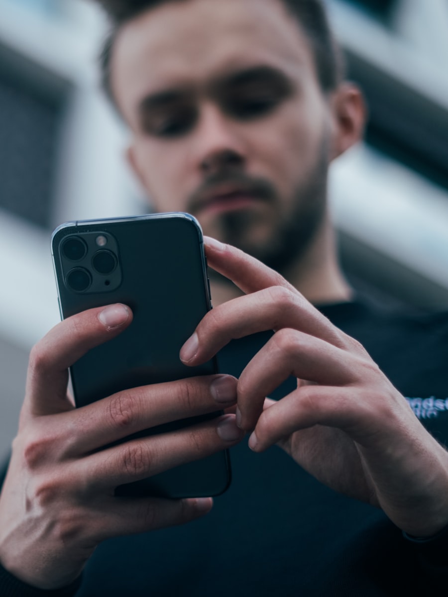 Athlete checking their training on a phone